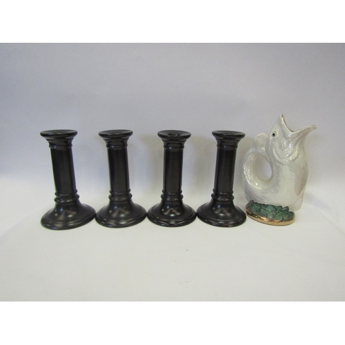 1350 - A set of four Doulton black glazed candlesticks and vintage glug jug (5)