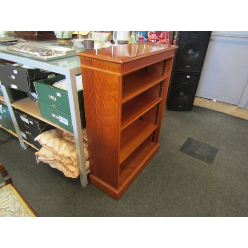 1449 - A yew wood floor standing bookcase with adjustable shelves, 97cm tall x 78cm wide x 31cm deep