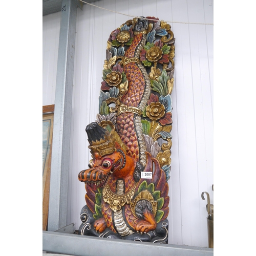 2087 - An Eastern heavily carved dragon wall hanging