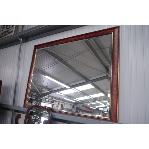 2135 - A large Oriental red and gold lacquered mirror with bevelled glass 106cm x 138cm   (E) £40-60