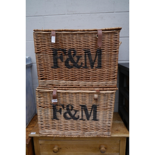 2316 - Two wicker hamper baskets with F&M stencilling