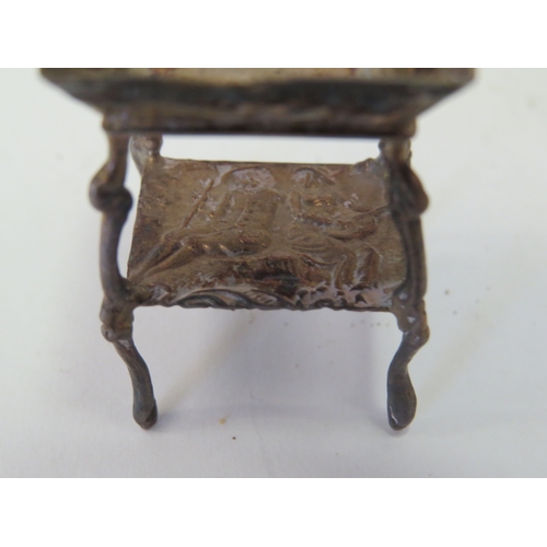 1100 - Eight Continental silver miniature tables of different designs. A similar piano and rocking cradle. ... 