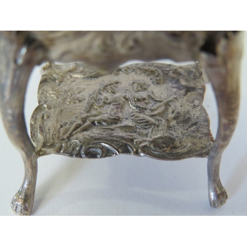 1100 - Eight Continental silver miniature tables of different designs. A similar piano and rocking cradle. ... 