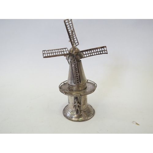 1103 - Seven Continental silver and white-metal miniature novelties including two Dutch windmills, two figu... 