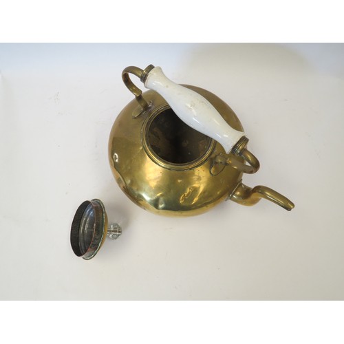 1096 - Mixed brass and copper items comprising a ceramic-handled kettle, hand-bell with wooden handle (clap... 