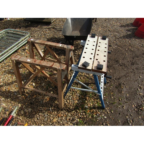 3369 - A folding work bench together with two trestles (3)