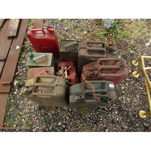 3379 - A quantity of mixed fuel cans including a Shell with brass cap and one with a BP brass cap