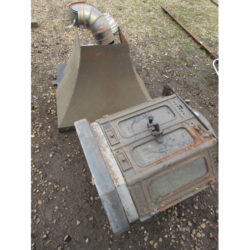 3405 - A cast wood-burner with hood