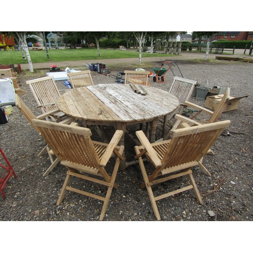 3420 - A garden table with eight hardwood chairs