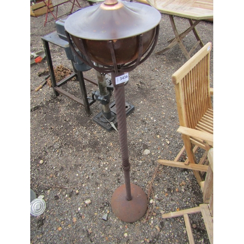 3436 - A metal garden oil lantern