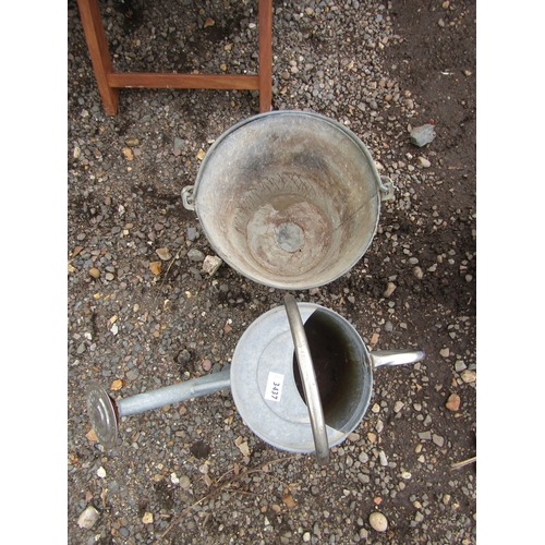 3437 - A galvanised bucket and watering can       (R)8-12