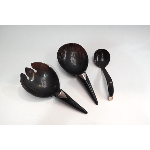 4455 - A moulded horn salad set and ladle with silver panels