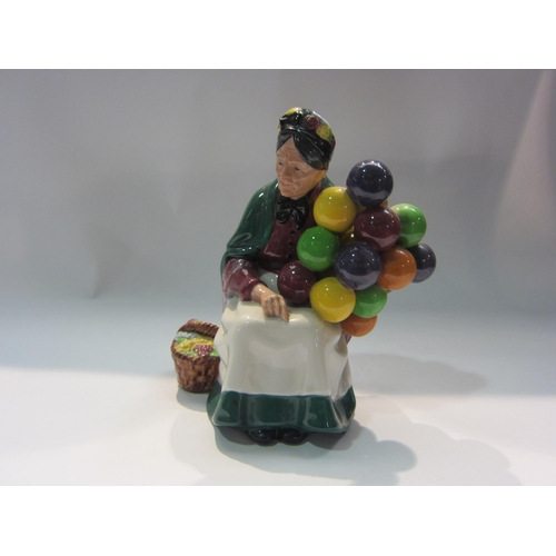 4266 - A Royal Doulton HN 1315 'The Old Balloon Seller' figure, 19cm tall