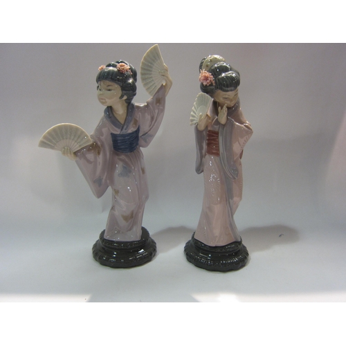 4274 - A pair of Lladro Japanese girls with fans, 29.5cm tall