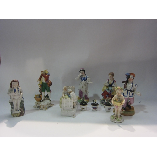 4275 - A Victorian hard paste porcelain fairing, various 19th Century figurines to include female seated wi... 