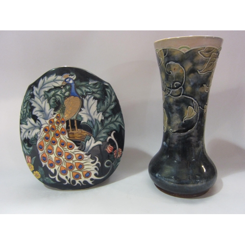 4276 - An Old Tupton Ware vase with peacock design, 23cm tall, and a Royal Doulton vase with floral design,... 