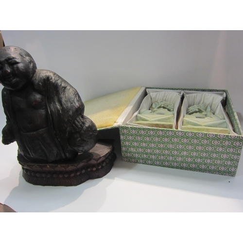 4313 - A hardwood figure of a seated Buddha on plinth base, together with a pair of Temple Dog hard stone f... 