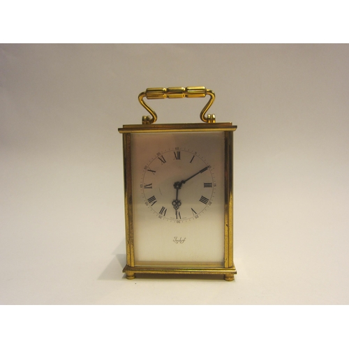 4413 - An Imhof brass cased carriage clock, marked Swiss