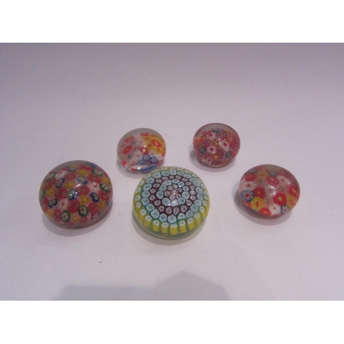 4427 - A millefiori paperweight and four further examples (5)