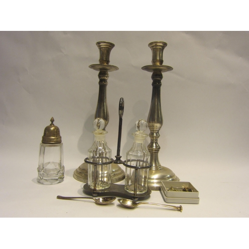 4436 - A pair of plated candlesticks, silver spoon and another, 9ct gold cross, silver topped shaker, etc.