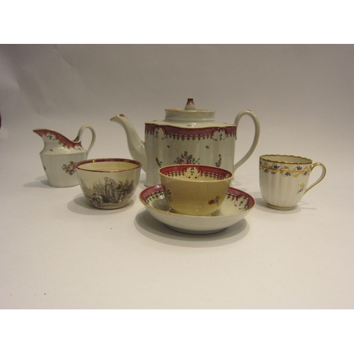 4468 - An 18th Century Hilditch teapot N273 to base, hairline cracks, and matching cream jug together with ... 