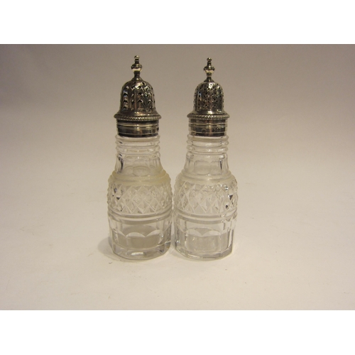 4471 - Two crystal sugar sifters with silver tops, one marked Chester