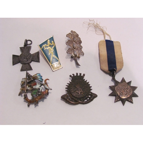 4408 - A selection of medals and badges to include George and the Dragon enamelled brooch