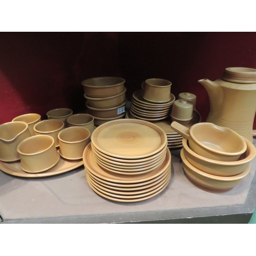 4326 - A selection of tan colour Studio pottery tableware including coffee pot, cups and saucers etc      (... 