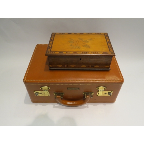 4431 - A marquetry jewellery box with mirror to interior containing various penknives and a Winship Luggage... 