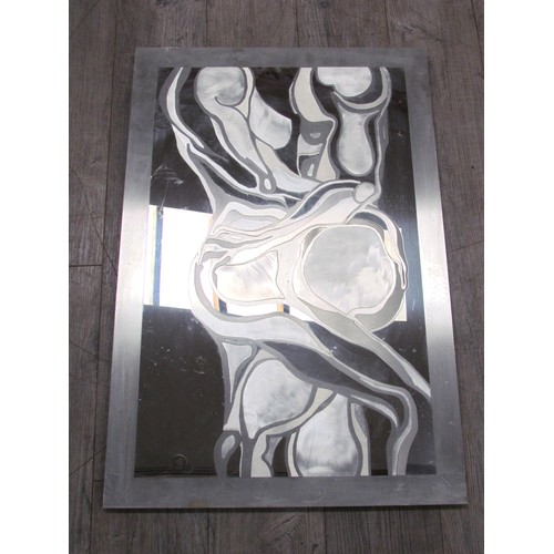 2386 - A circa 1970's abstract wall mirror with brushed metal silhouette relief intertwined couple. 93cm x ... 