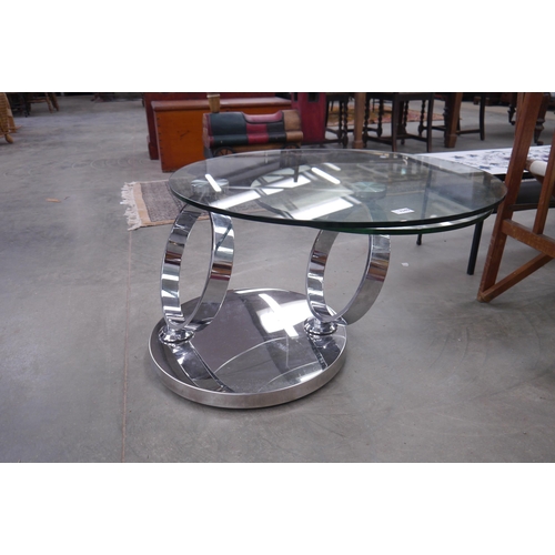 2446 - A glass and chrome Swirl coffee table