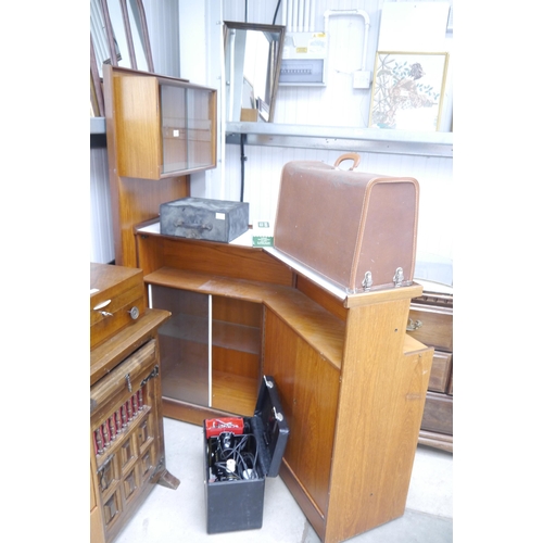 2431 - A 1970s teak cocktail bar with glazed doors