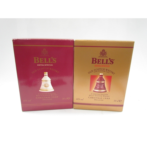 9036 - Two Bell's Whisky decanters Christmas 1999 and Christmas 2000 (2)