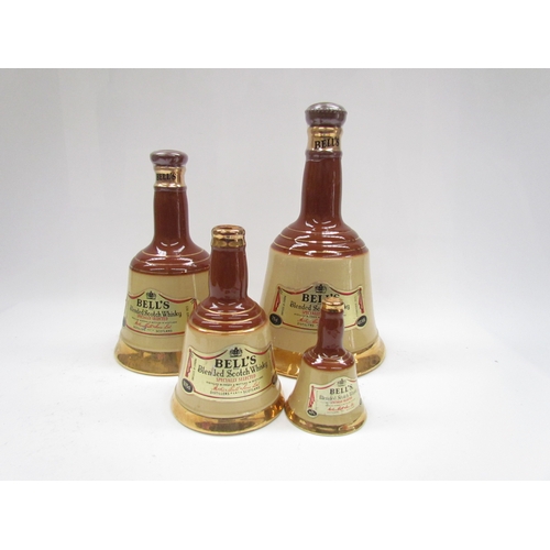 9037 - Four graduated Bell's Whisky bells and contents 75cl, 37.5cl, 18.75cl and miniature