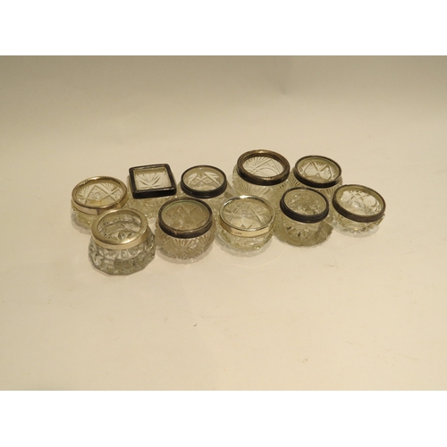 4329 - Ten various silver rimmed glass salts