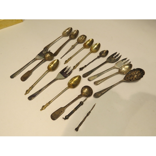 4331 - A box of miscellaneous silver and plated spoons to include mustard, tea and apostle examples and too... 