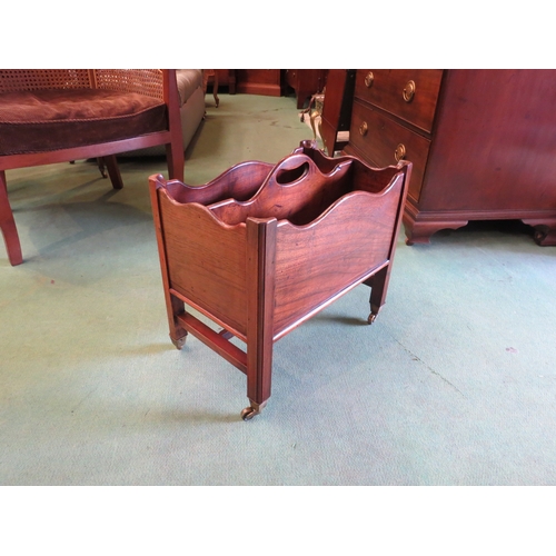 4232 - A George III revival mahogany two division Canterbury the fret handle over chamfered square legs on ... 