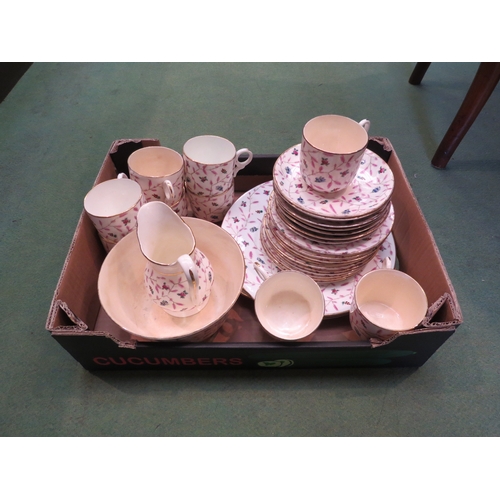 4254 - A floral patterned part coffee set with two matching plates and bowl