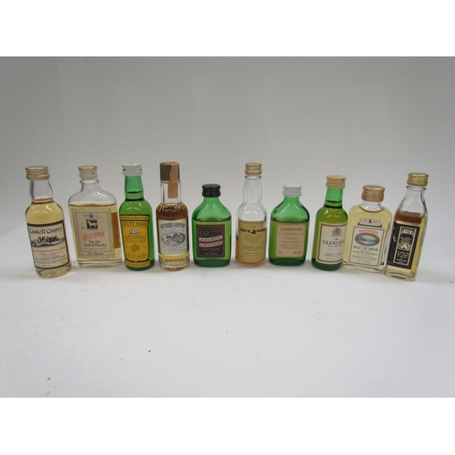 9044 - A quantity of miniatures mostly Whisky