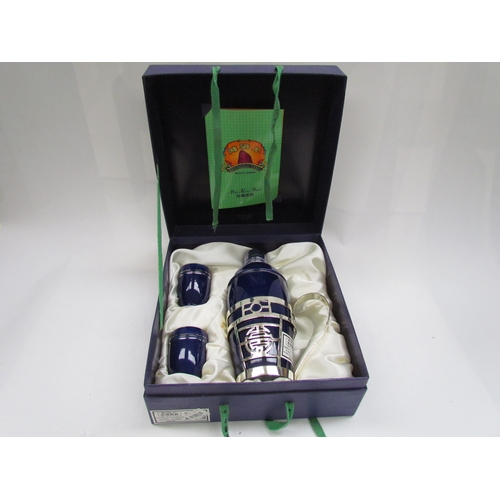 9084 - A Shanghai Tan presentation flask and cups. Mei Kuel Wine  (E) £10-15