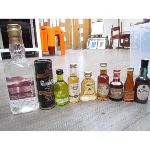 9100 - A box of mixed spirits including Licor Beirao, Linie Aquavit, Grenadine, Kwan Phayao and a selection... 