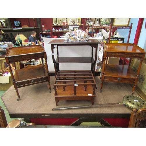 4015 - A pair of burr walnut side tables, two tier with brushing slides and drawer on brass castors, scratc... 