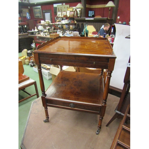 4015 - A pair of burr walnut side tables, two tier with brushing slides and drawer on brass castors, scratc... 