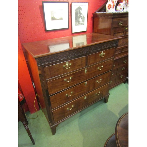 4035 - A 19th Century mahogany chest of two short over three long drawers, blind fret panel, brass swan nec... 