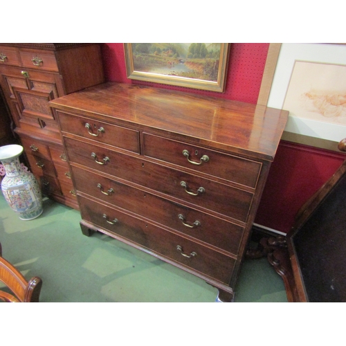 4041 - A George III mahogany two over three long drawer chest raised on bracket feet, 108cm tall x 122cm wi... 