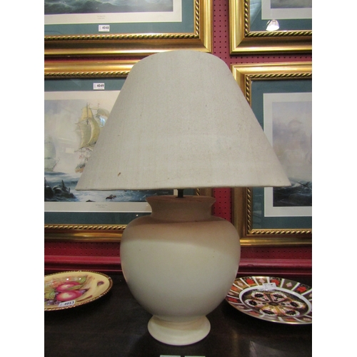 4052 - A modern cream table lamp of bulbous form with shade