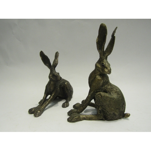 4108 - A pair of sitting Hares, tallest 18cm