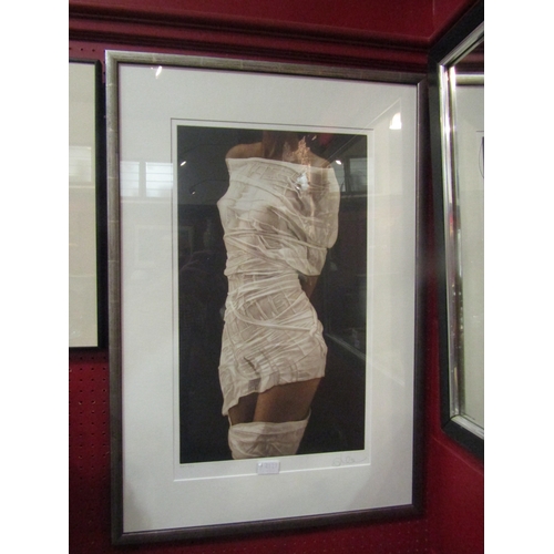 4127 - A limited edition print of a female torso, no. 34/250, pencil signed by artist lower right, framed a... 