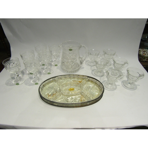 4130 - A set of six Stuart Crystal wine glasses, a set of six custard cups, a Stuart Crystal jug and servin... 