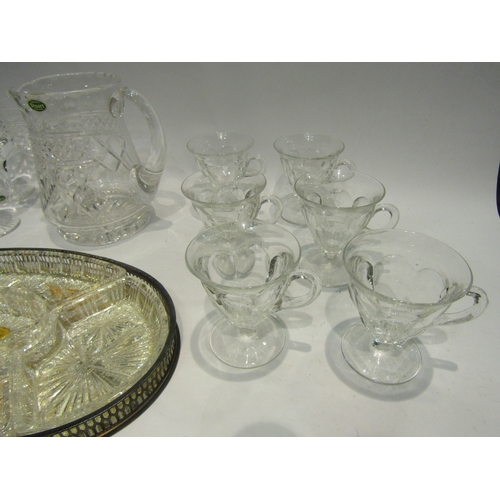 4130 - A set of six Stuart Crystal wine glasses, a set of six custard cups, a Stuart Crystal jug and servin... 